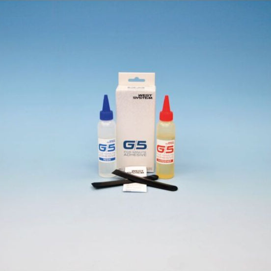 A G5 adhesive kit with two squeeze bottles (one blue-capped, one red-capped), a white box, and two black applicator tools on a blue gradient background.
