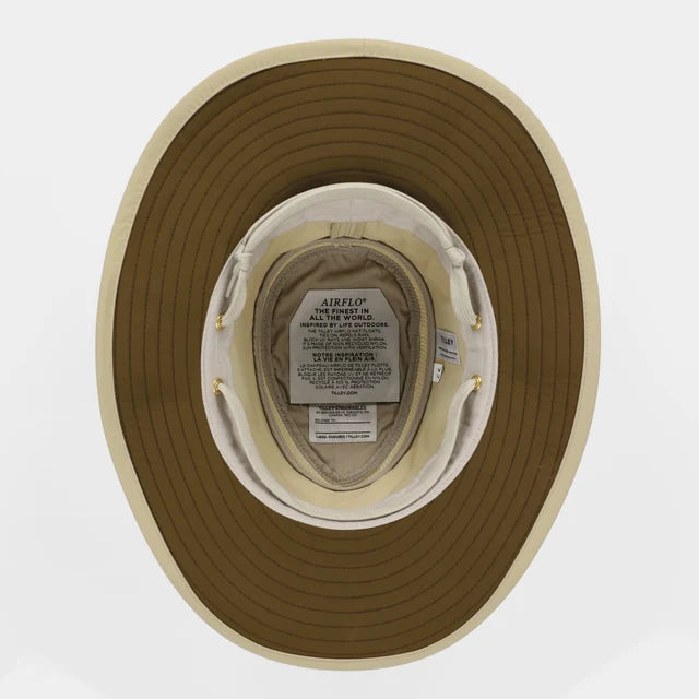 Close-up of a brown fishing hat with Airflo branding on a white background