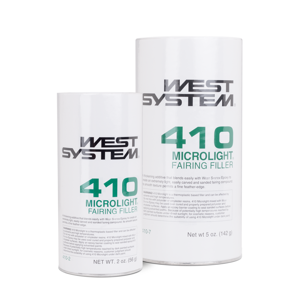 Two white cylindrical product containers for West System 410 Microlight Fairing Filler, one 2 oz and one 5 oz, shown on a clean white background.
