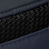 Close-up of a navy blue fabric with black mesh pattern